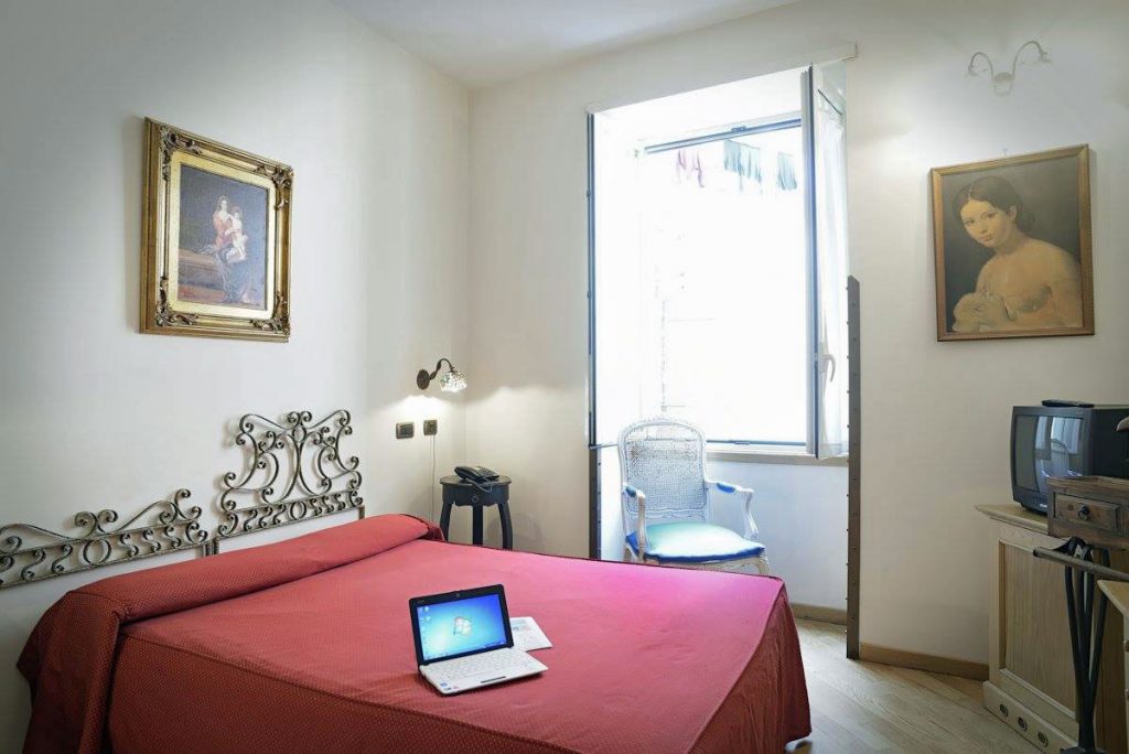 Guest room of Grand Hotel Europa Naples, italy